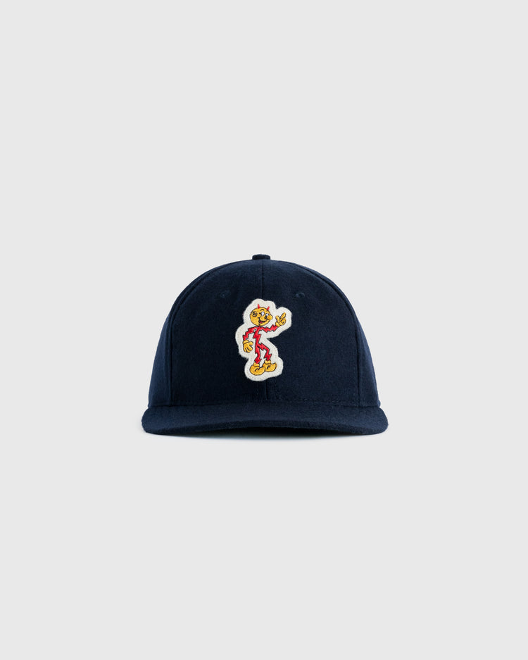 The EFF Reddy Kilowatt 1940 Authentic Wool Ballcap is a navy blue cap with a colorful patch of the vintage mascot skateboarding on the front, shown against a plain light gray background.