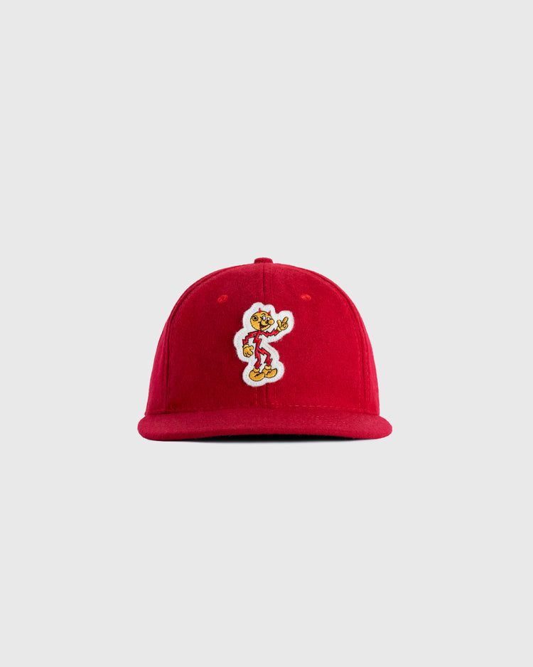The EFF Reddy Kilowatt 1940 Authentic Wool Ballcap is a red cap with a colorful vintage Reddy Kilowatt mascot patch, displayed on a plain light gray background.