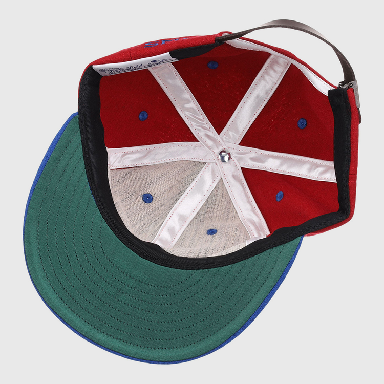 The EFF Southern Methodist University Mascot Vintage Ballcap features white stitched panels, blue ventilation holes, a green underbrim, and an adjustable brown strap—classic elements of a collegiate wool cap.