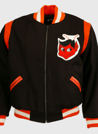 The EFF St. Louis Browns 1952 Authentic Jacket is a black vintage wool baseball jacket with orange and white striped cuffs, collar, and waistband, featuring a red cartoon devil face patch with black hair on the chest.
