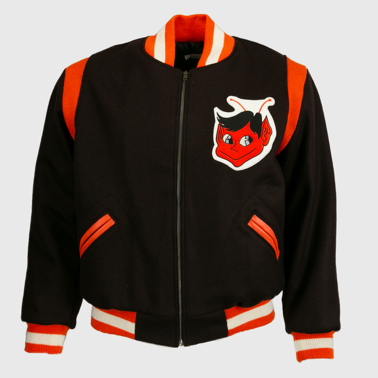 The EFF St. Louis Browns 1952 Authentic Jacket is a black vintage wool baseball jacket with orange and white striped cuffs, collar, and waistband, featuring a red cartoon devil face patch with black hair on the chest.