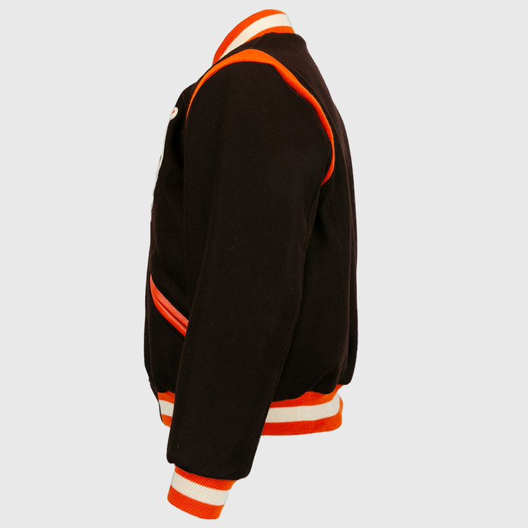 Side view of the EFF St. Louis Browns 1952 Authentic Jacket in black wool, featuring orange and white striped cuffs, collar, waistband, and orange trim along seams and pockets.