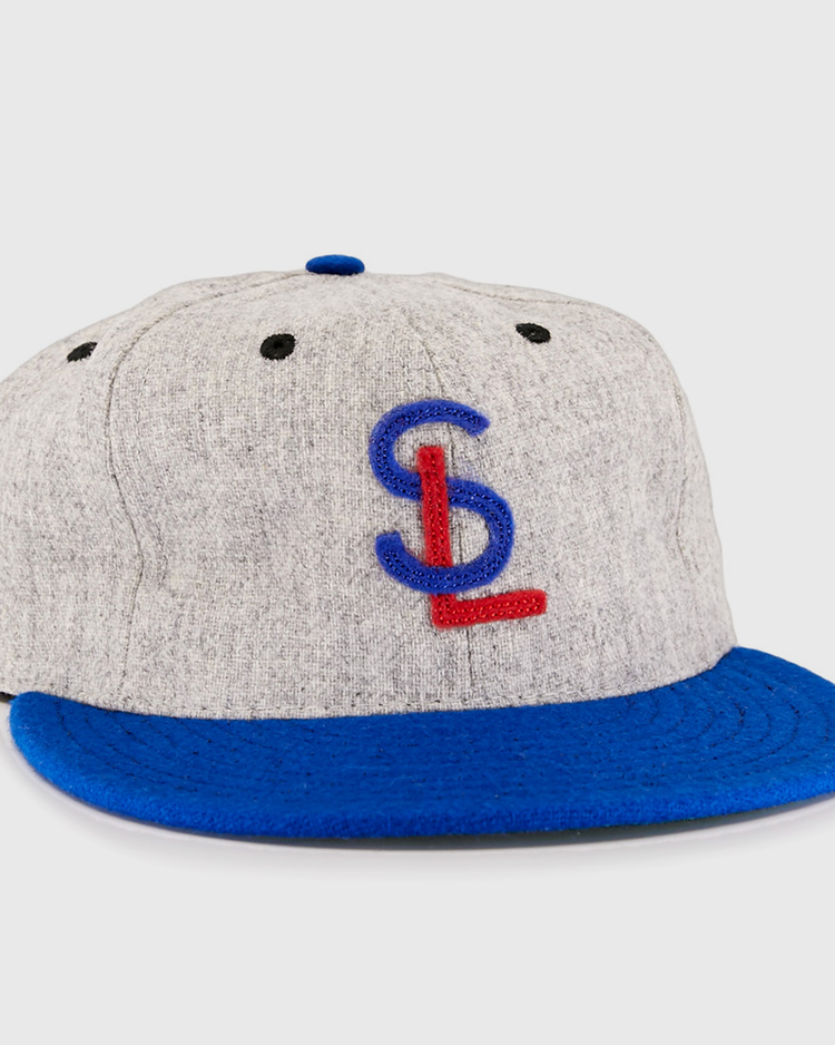 The EFF St. Louis Stars 1929 Vintage Ballcap features a gray body, blue brim, and blue/red embroidered SL initials—paying tribute to the Negro National League’s iconic 1929 original.