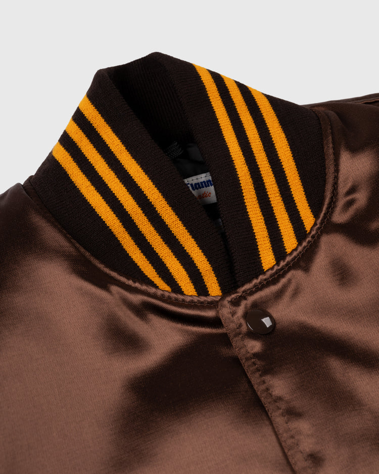 Close-up of the EFF San Diego Padres 1969 Authentic All Satin Varsity Jacket, featuring a shiny brown finish, ribbed collar with black and yellow stripes, and snap button closure.