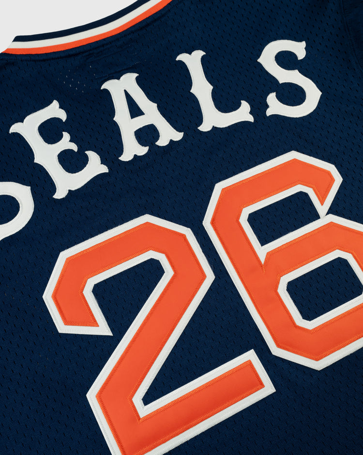 A close-up of the EFF San Francisco Seals Mesh V-Neck Jersey, featuring white SEALS lettering and the number 26 in orange and white on navy blue polyester mesh.