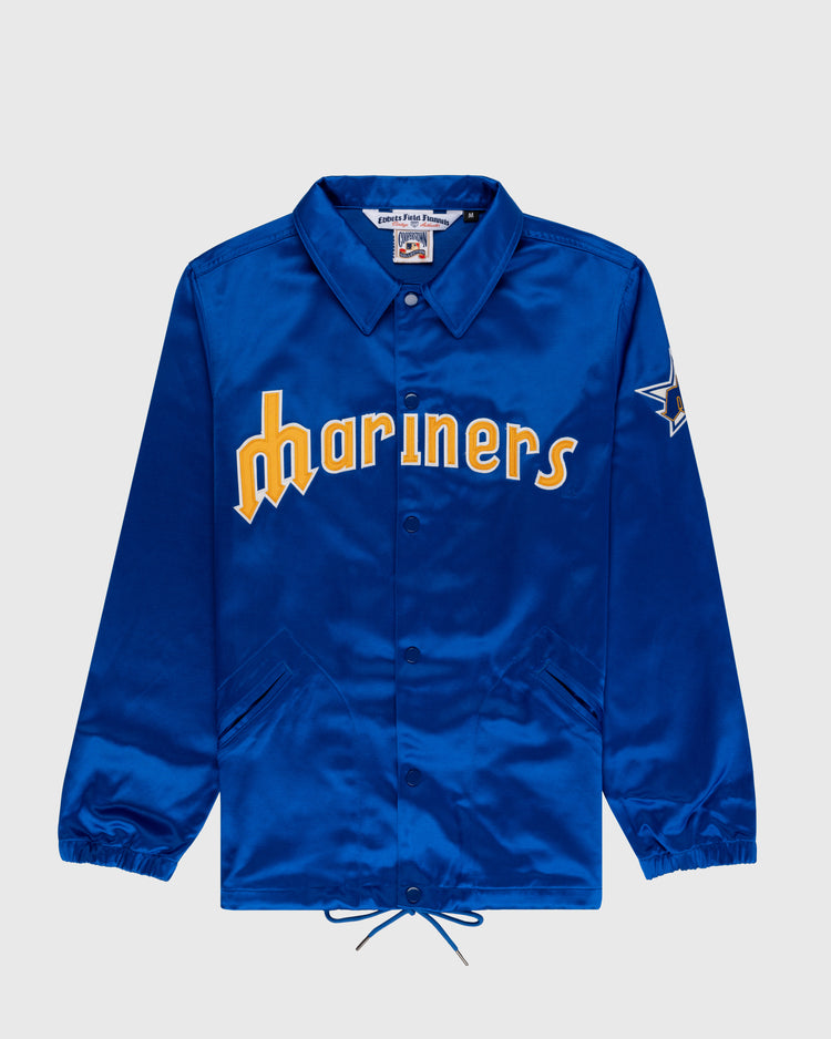 EFF Seattle Mariners 1982 Satin Windbreaker Jacket in bright blue, features Mariners in yellow and white on the front, side pockets, elastic cuffs, drawstring hem, and a blue and white left sleeve patch—authentic MLB vintage style.