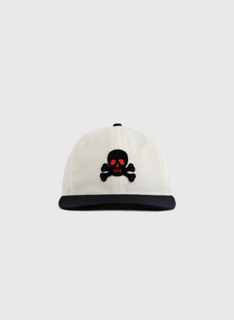 The EFF Sioux City Ghosts Two Tone Vintage Inspired Wool Ballcap is a white cap with a black brim, featuring a black skull and crossbones with red eyes embroidered on the front, shown against a plain light gray background.