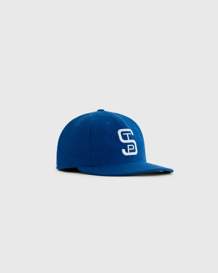 The EFF St. Paul Saints 1955 Authentic Wool Ballcap is a blue vintage cap with a curved brim and white embroidered SD logo, shown on a light gray background—ideal for collectors and fans of classic style.