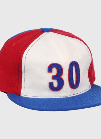 The Tim Raines Signature Series Ballcap by Ebbets Field Flannels is a vintage wool cap in red, white, and blue with 30 on the front and a blue brim—classic style perfect for National Baseball Hall of Fame fans.