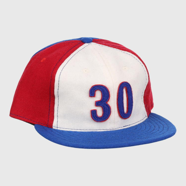The Tim Raines Signature Series Ballcap by Ebbets Field Flannels is a vintage wool cap in red, white, and blue with 30 on the front and a blue brim—classic style perfect for National Baseball Hall of Fame fans.