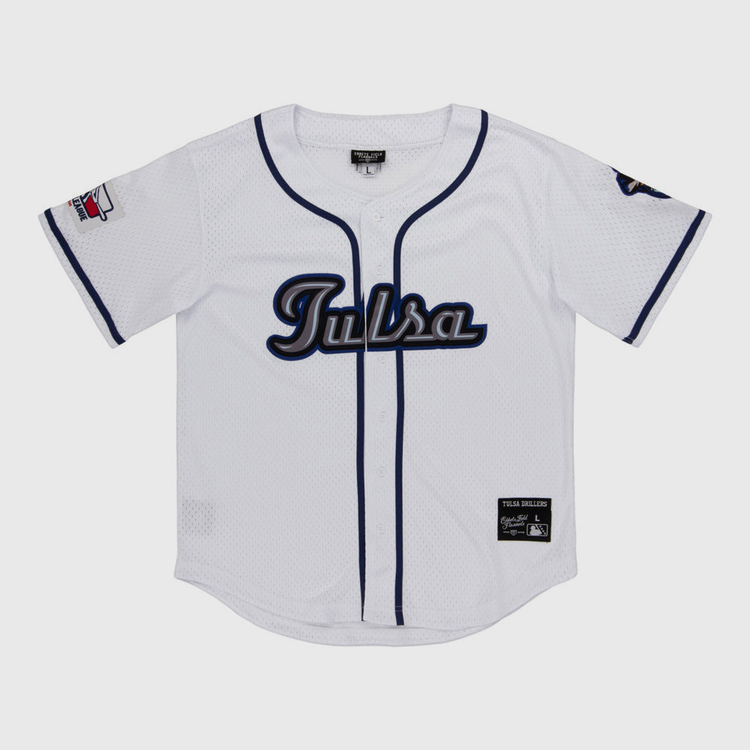 The Ebbets Field Tulsa Drillers MiLB Button Down Jersey features white fabric, 