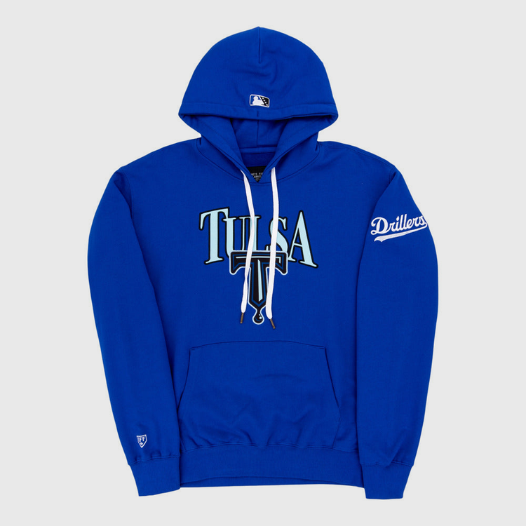 The Ebbets Field Tulsa Drillers MiLB Cotton Hooded Sweatshirt is royal blue with TULSA on the front, a small baseball cap logo on the hood, Drillers on the sleeve, and a front pocket.