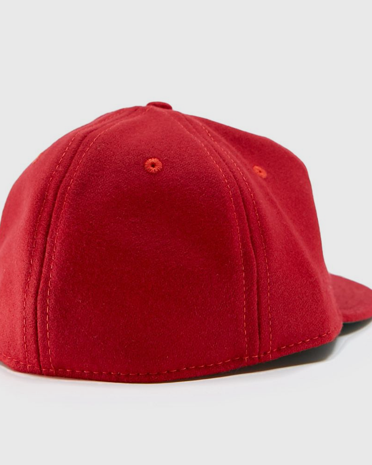 The EFF Tulsa Oilers 1966 Vintage Ballcap, shown from the back left, features visible stitching and a flat brim in plain red against a white background.