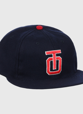 The EFF Tulsa Oilers 1969 Vintage Ballcap is a navy cap with a red and white embroidered TJ logo, red top button, and classic styling inspired by the 1969 Pacific Coast League design.