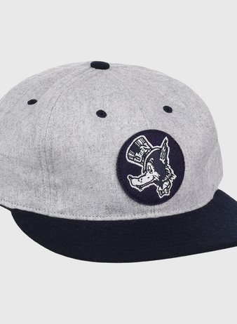 The EFF University of Nevada Wolf Pack Mascot Collegiate Wool Ballcap features a vintage gray crown, dark blue brim, and a front circular patch of a donkey in a hat—an officially licensed college vault design.