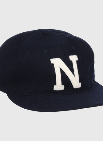 The EFF University of Nevada Wolf Pack Patch Collegiate Wool Ballcap is a navy blue vintage-style cap with a bold white N on the front, ideal for fans wanting classic college sports flair.