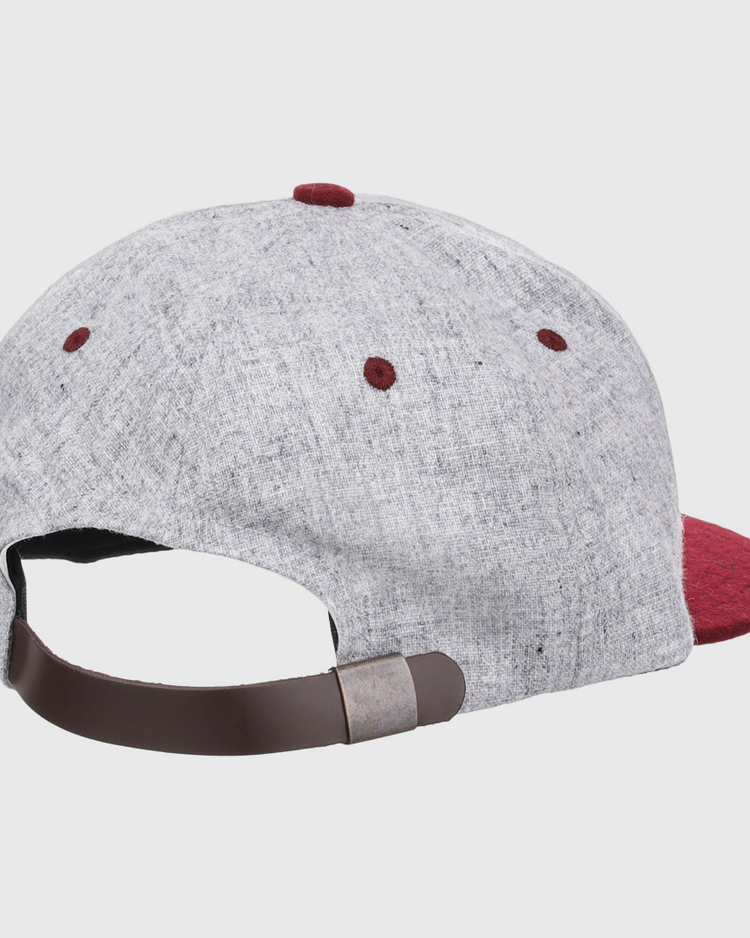 The EFF University of South Carolina 1949 Vintage Ballcap is gray and red, shown from the back with a brown adjustable strap and metal clasp, plus red accents on the top button and eyelets.