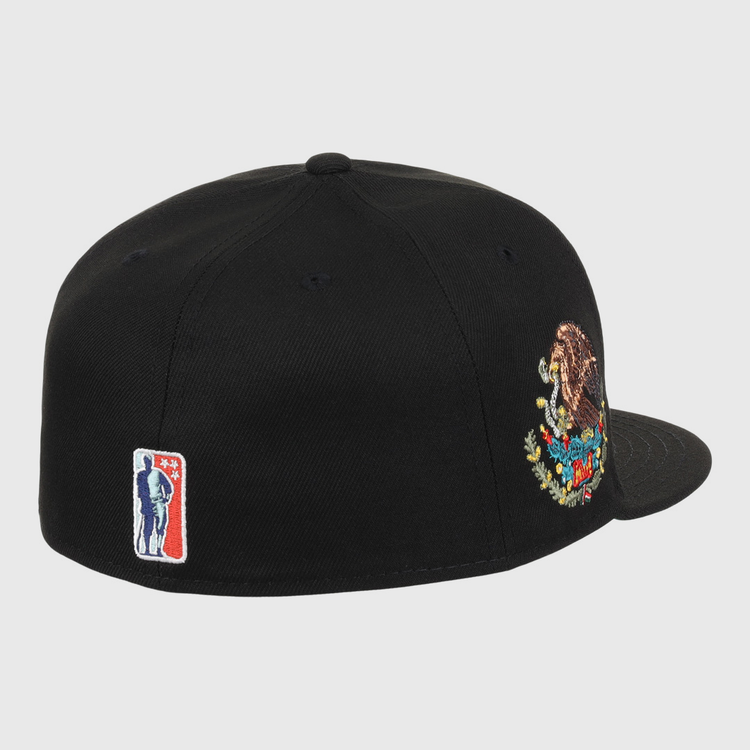 The EFF Veracruz Azules NLB Team Color Fitted Ballcap is black with an embroidered Mexico coat of arms on the side and a small red, white, and blue baseball player logo near the back.