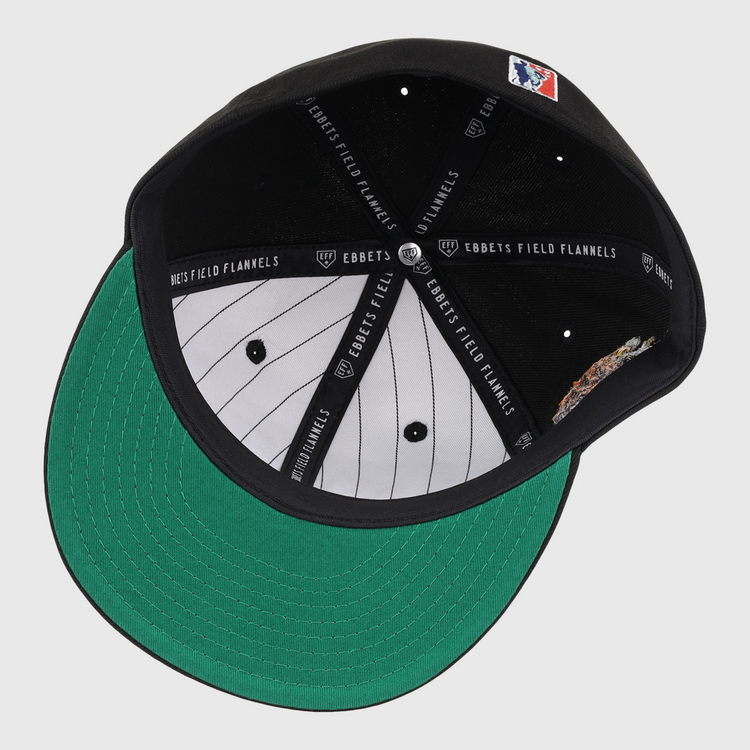 The Veracruz Azules NLB Team Color Fitted Ballcap by EFF has a green underbrim, grey pinstriped lining, branded inner bands, and a sewn patch with a baseball player in the inner crown.