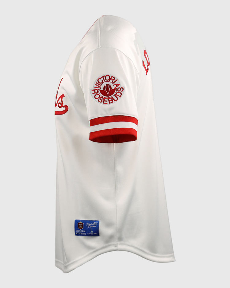 The Victoria Rosebuds EFF Lone Star Baseball Jersey by EFF features red sleeve stripes, a PORTLAND ROSEBUDS patch, red script on the chest, and a blue and gold tag near the hem inspired by North Division rivals.