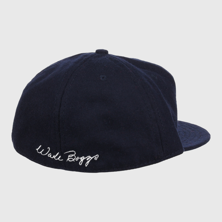 The Wade Boggs Signature Series Ballcap by Ebbets Field Flannels is a navy vintage wool cap with Wade Boggs embroidered in white on the side, honoring his legacy in the National Baseball Hall of Fame.