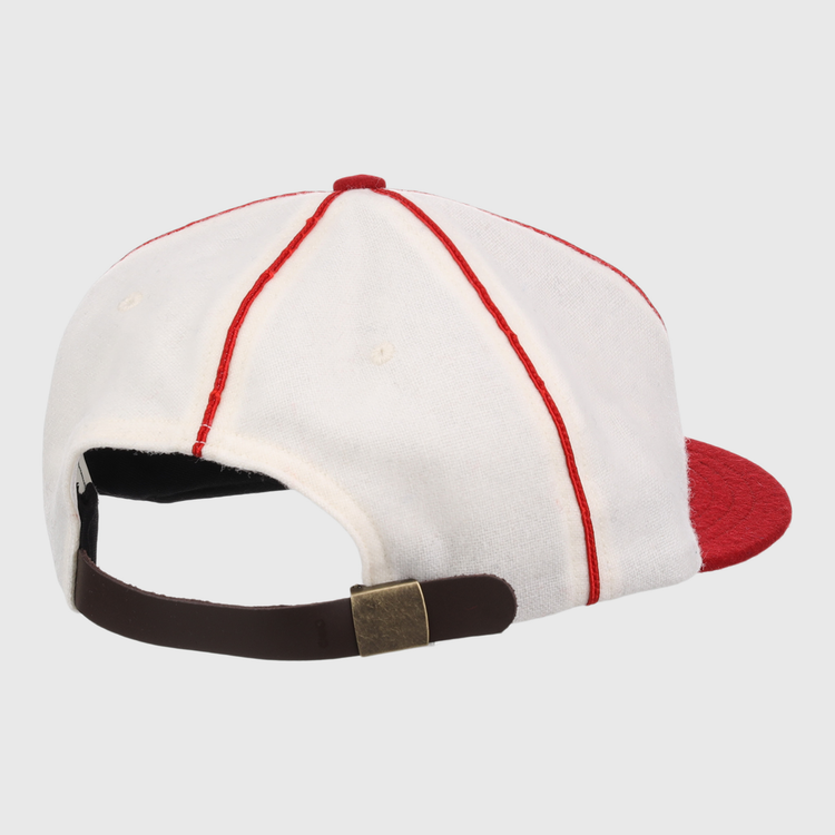 The EFF Washington Elite Giants 1936 Vintage Ballcap is shown from the back with white fabric, red seams, a red brim, and an adjustable brown strap with a brass-colored buckle.