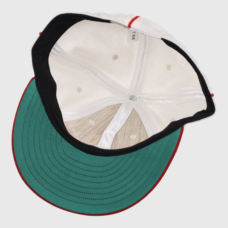 The image displays the inside of an EFF Washington Elite Giants 1936 Vintage Ballcap, featuring a green underbrim, black sweatband, red piping, and a size tag marked 7 1/8.