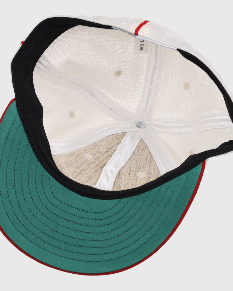The image displays the inside of an EFF Washington Elite Giants 1936 Vintage Ballcap, featuring a green underbrim, black sweatband, red piping, and a size tag marked 7 1/8.