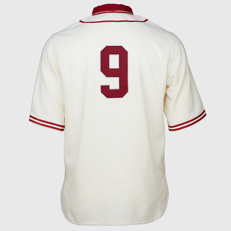 The EFF Washington State University 1937 Home Jersey is a white baseball jersey with red sleeve and collar trim, featuring a large red number 9 on the back—an authentic vintage reproduction for Cougars fans.