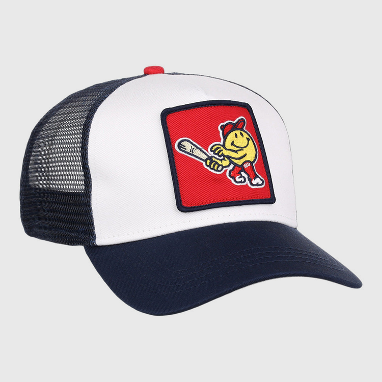 The Ebbets Field Worcester Red Sox MiLB Trucker Ballcap features a white front panel, navy blue bill and mesh back, plus a red patch with a cartoon baseball character holding a bat and wearing a cap.