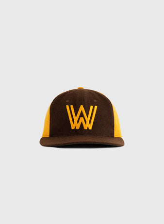 The EFF Walla Walla Padres 1974 Authentic Wool Ballcap features a brown and yellow design with a bold yellow “W” logo, replicating the original Northwest League style, shown against a plain light gray background.