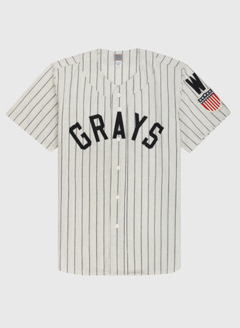 The Ebbets Field Flannels Homestead Grays 1944 Authentic Wool Home Baseball Jersey features white fabric with thin black pinstripes, bold GRAYS lettering, and a left sleeve patch honoring Negro Leagues Baseball Museum history.