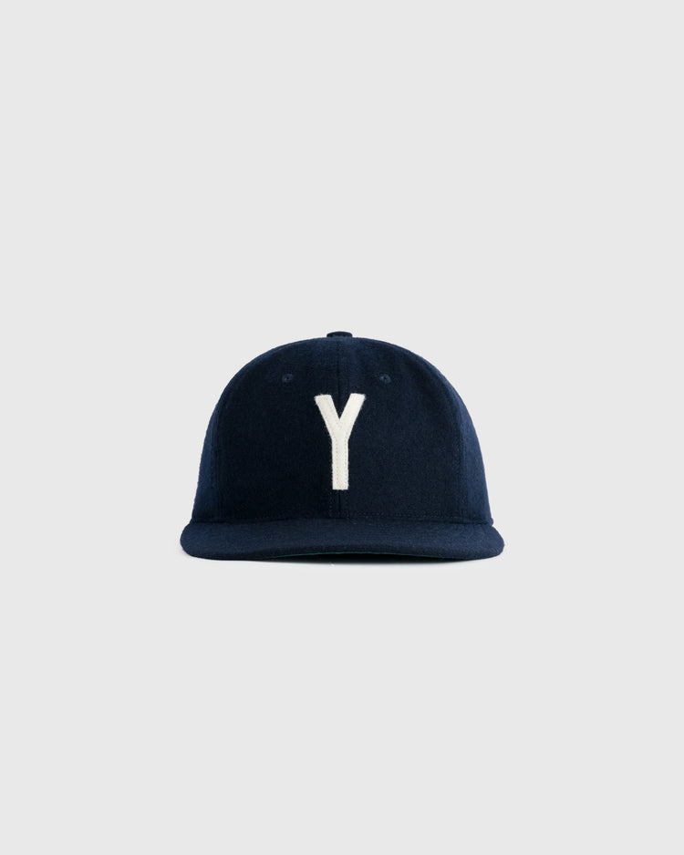 The EFF Yale University 1948 Authentic Wool Ballcap is a navy blue cap featuring a large white Y on the front, set against a plain light gray background.