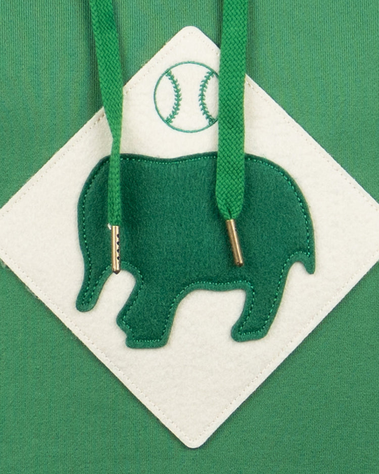 The Denver White Elephants French Terry Script Hooded Sweatshirt by EFF features a green felt elephant on a white diamond patch with a green baseball, set against green fabric and finished with metal-tipped drawstrings—a nod to classic baseball clubs.