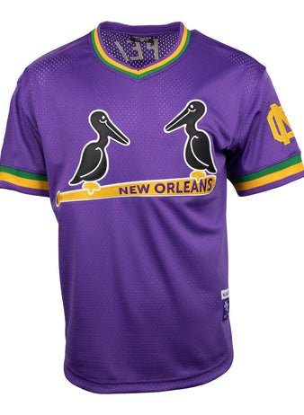 The EFF New Orleans Black Pelicans Vintage Inspired NL Replica V-Neck Mesh Jersey features purple mesh with green and yellow accents, two black pelicans over a yellow bat, NEW ORLEANS text, and a yellow logo on the left sleeve.
