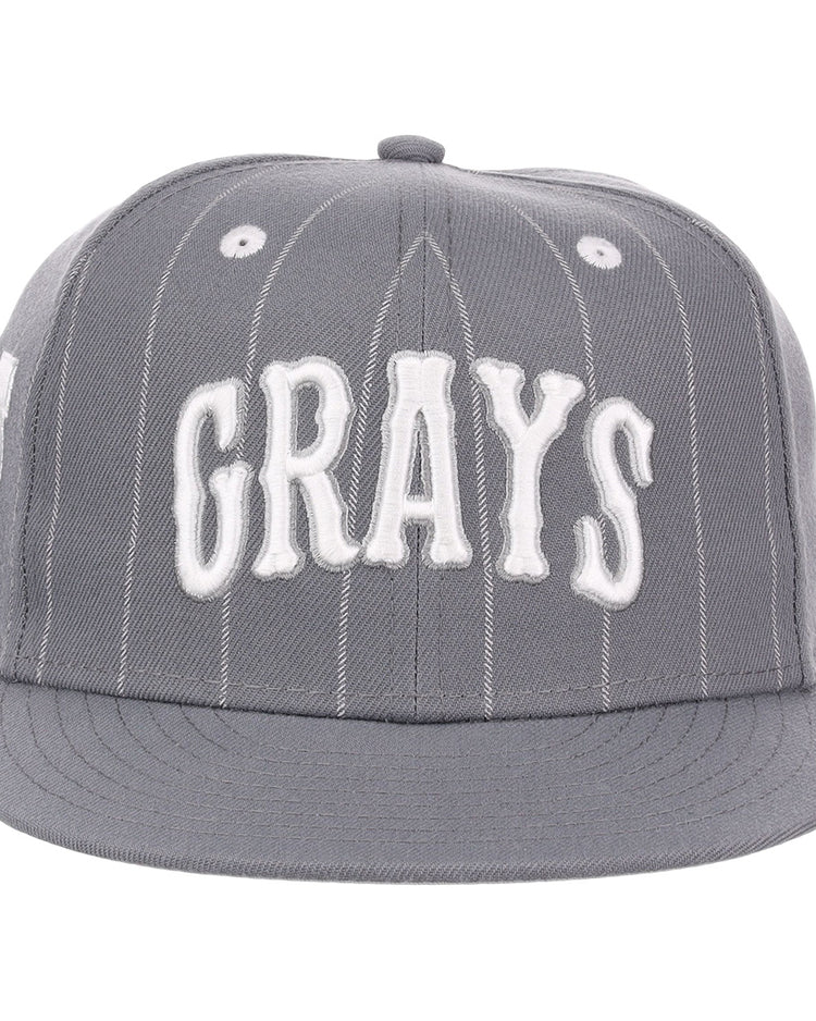 The EFF Homestead Grays NLB Black Pinstripe Fitted Ballcap features subtle white stripes and bold GRAYS embroidery, honoring the legacy of the Negro National League’s Homestead Grays.
