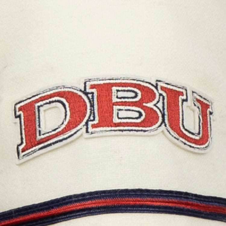 The EFF Dallas Baptist University Home Jersey features a cream base with bold red DBU letters outlined in blue, and navy and red stripes below, evoking a classic collegiate style.