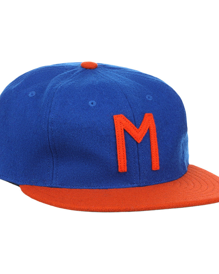 The EFF Morgan State University 1975 Vintage Ballcap features a blue crown, orange brim, and orange M on the front—crafted from genuine wool, its ideal for fans of classic style.