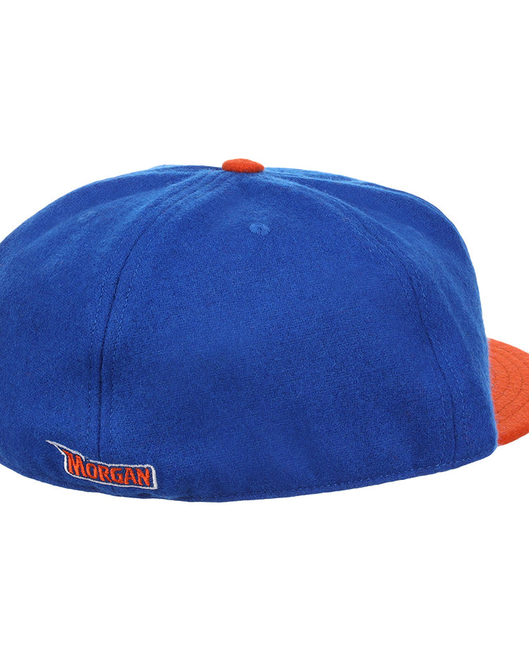 The EFF Morgan State University 1975 Vintage Ballcap is blue with an orange brim and button, features a small MORGAN logo embroidered on the back, and is shown rear view on a white background.