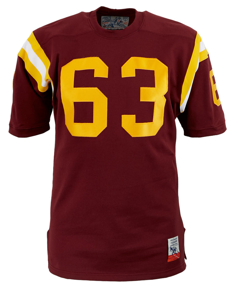 The EFF Boston College 1963 Durene Football Jersey features maroon fabric, yellow and white shoulder stripes, and the number 63 in yellow on the front and sleeve—an authentic tribute to the classic 1963 look.