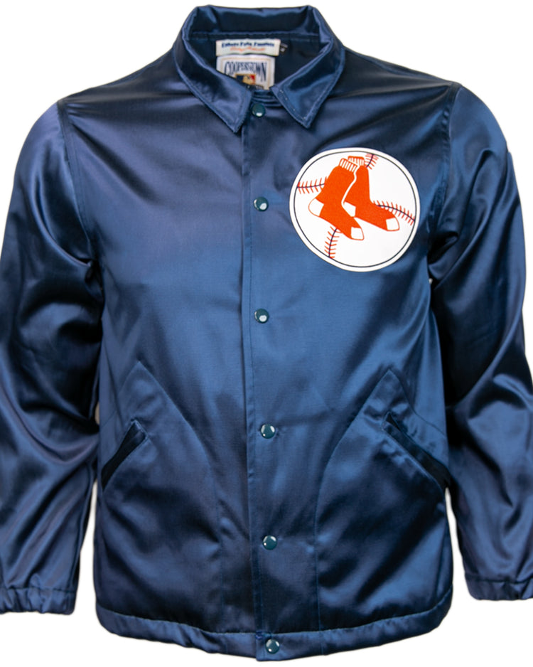The EFF Boston Red Sox 1967 Satin Windbreaker is navy blue with the team logo—two red socks over a white baseball—on the left chest, plus snap buttons and two front pockets.