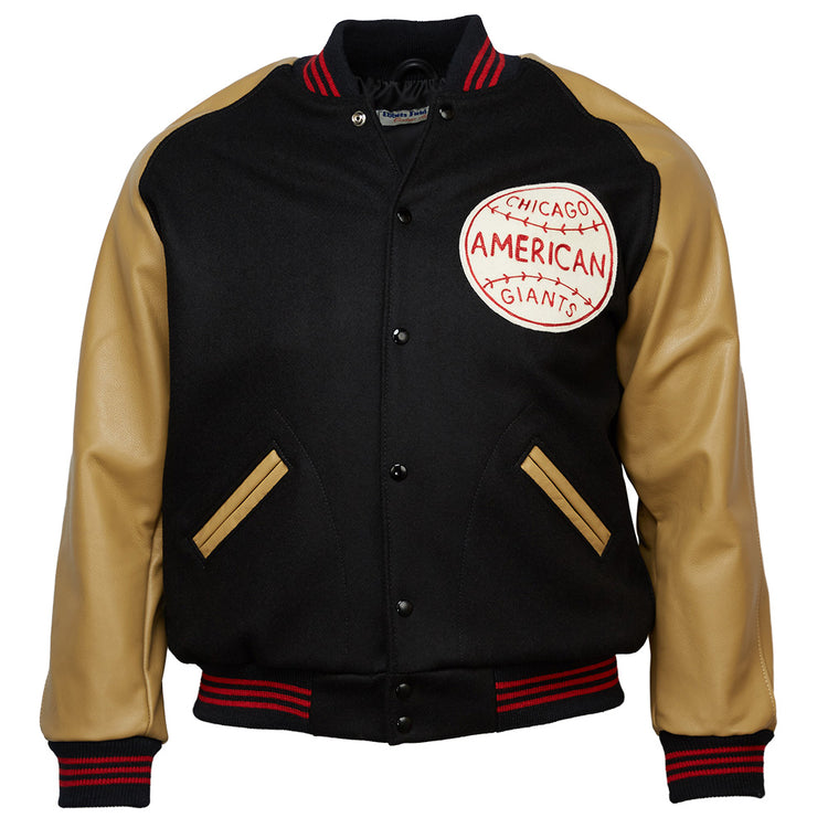 The EFF Chicago American Giants 1936 Authentic Jacket is black with tan leather sleeves, tan-trimmed pockets, red/black striped cuffs and collar, and a large team patch on the left chest.