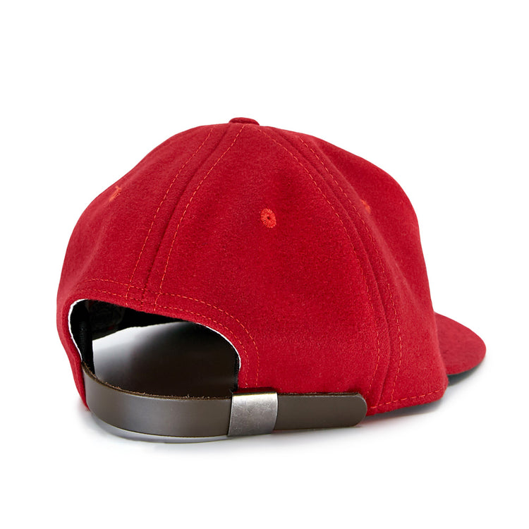 The Daiei Stars 1949 Vintage Ballcap by EFF is shown from the back in red, featuring a brown adjustable strap with a silver buckle and white seam stitching, all set against a plain white background.