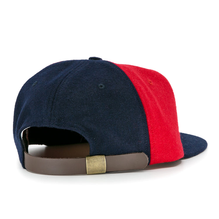 EFF Denver Bears 1983 Vintage Ballcap in navy blue and red wool, shown from the back with a brown leather strap and brass buckle for size adjustment. Classic two-tone design, made in the USA.