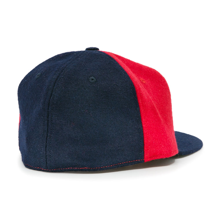 The Denver Bears 1983 Vintage Ballcap by EFF features alternating navy blue and red wool panels with a flat brim. Shown from the back and side, this classic USA-made cap captures true vintage style.