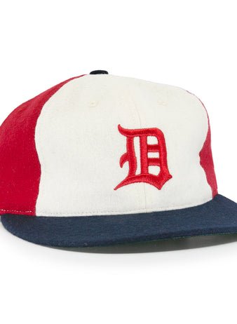 The EFF Denver Bears 1983 Vintage Ballcap features a wool design with a white front panel, red sides, and dark blue brim, plus a vintage-style red embroidered D inspired by the classic Denver Bears cap.