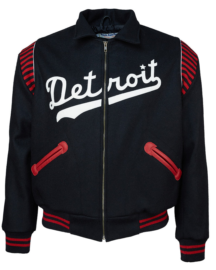 The EFF Detroit Stars 1950 Authentic Jacket is a black zip-up with red striped accents and pockets. Detroit appears in large white script on the chest, faithfully reproducing the classic Negro League jacket style.
