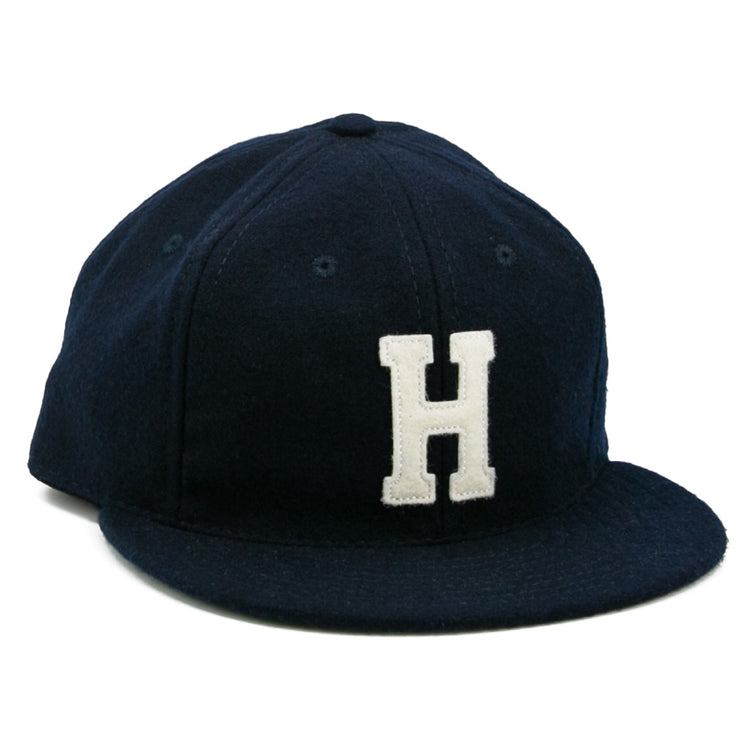 The EFF Howard University 1960 Vintage Ballcap is a dark blue cap with a white embroidered H on the front—ideal for fans after a classic collegiate look.