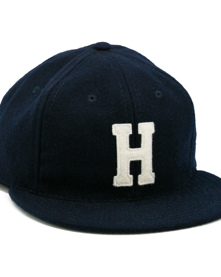 The EFF Howard University 1960 Vintage Ballcap is a dark blue cap with a white embroidered H on the front—ideal for fans after a classic collegiate look.