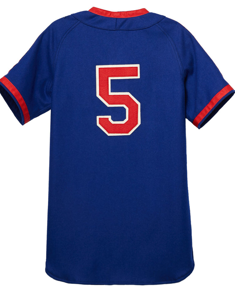 The EFF Indianapolis Clowns 1952 Road Jersey features blue fabric with red-trimmed collar and sleeves, plus a bold white and red number 5 on the back, honoring Henry Aaron’s legacy in the Negro Leagues.